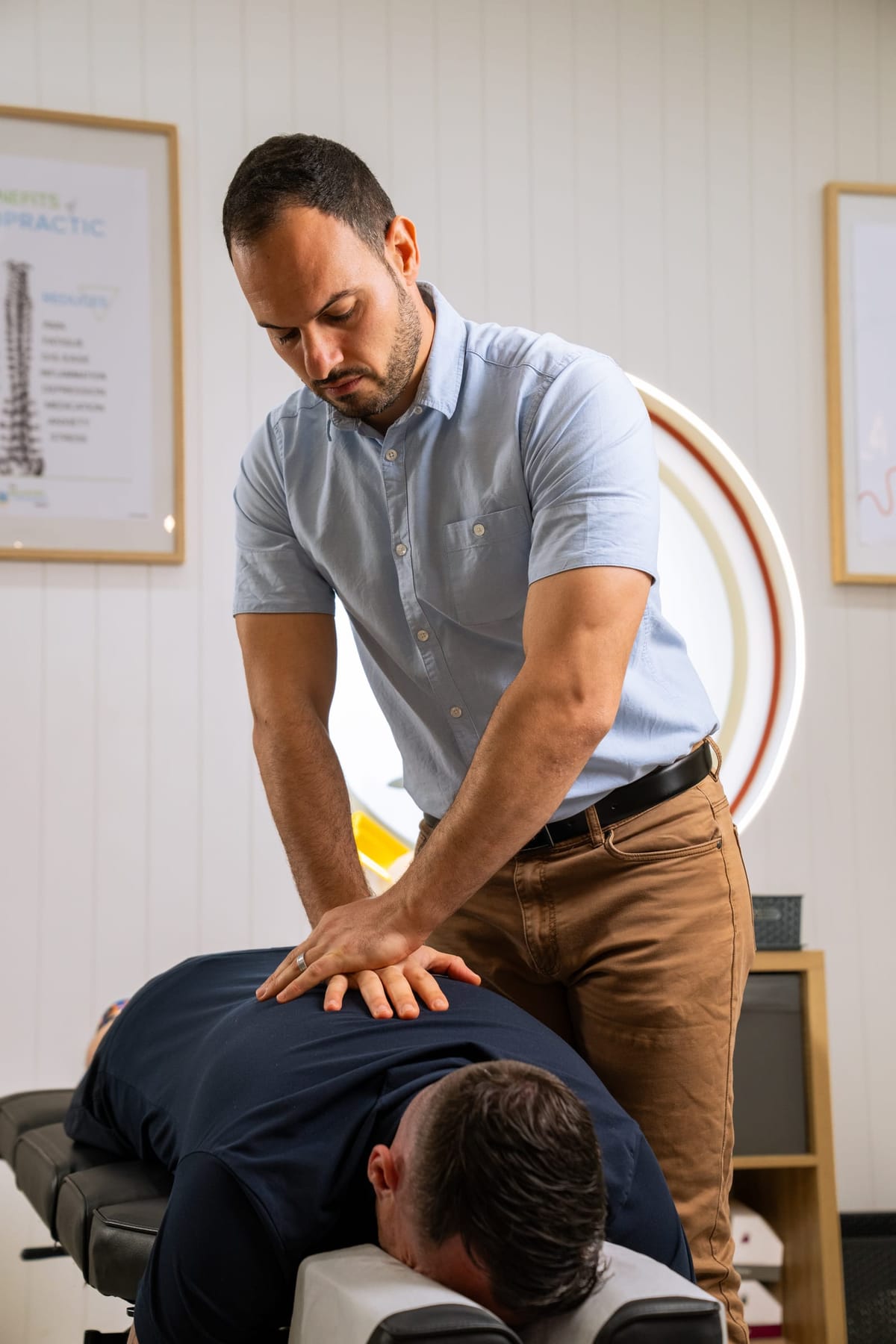 Dr Josh providing chiropractic care for neck and upper back tension
