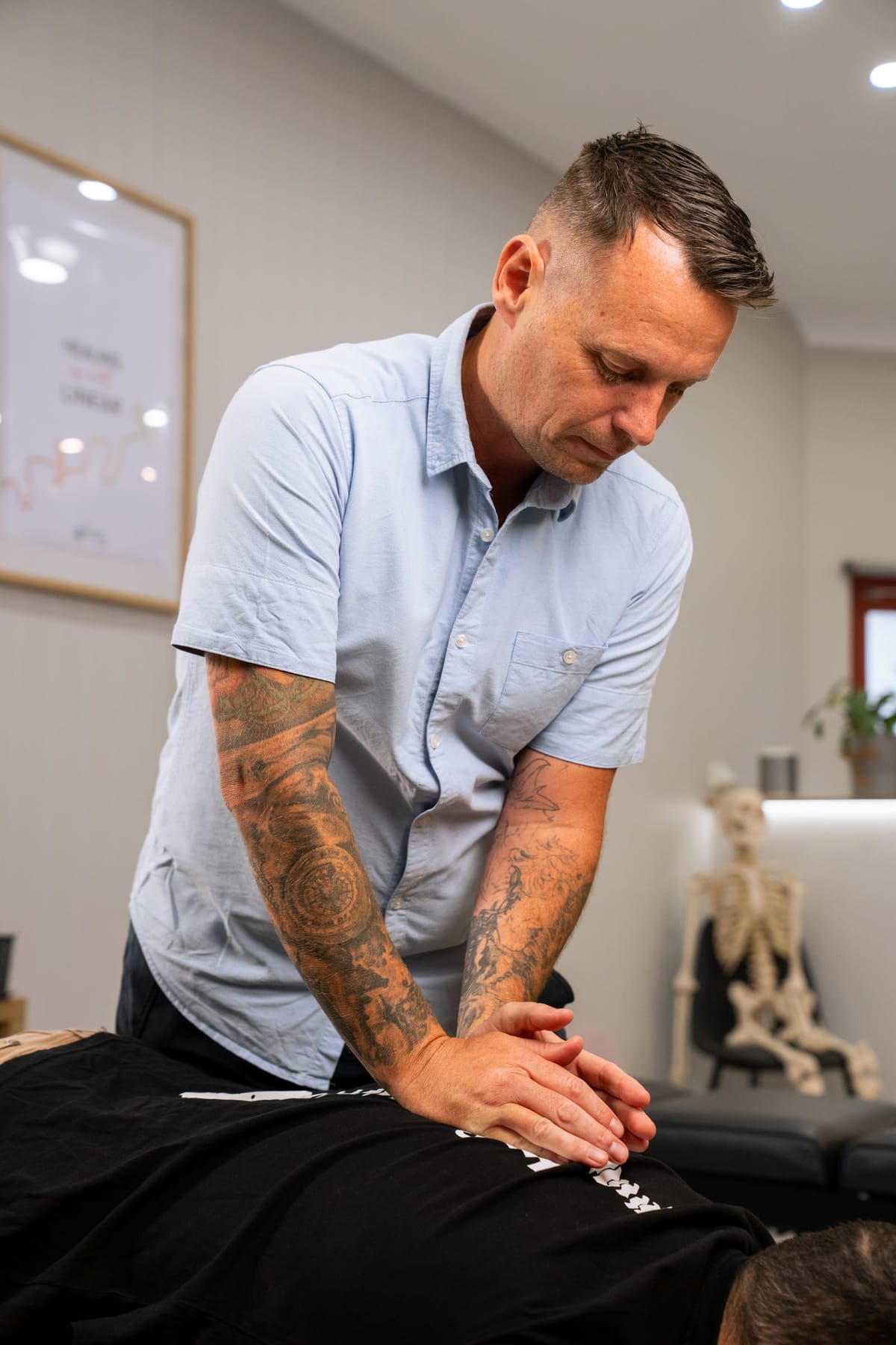 Dr David providing chiropractic care